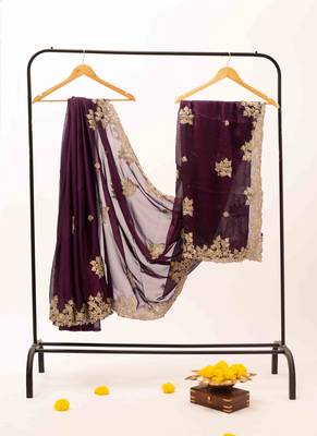Purple embroidered chiffon saree. 3