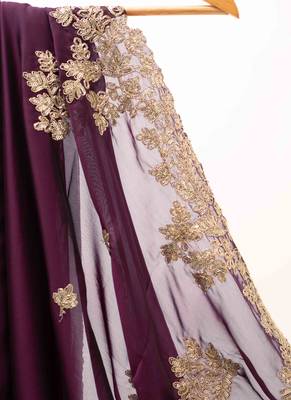 Purple embroidered chiffon saree. 4