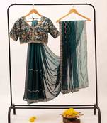 Elegant emerald embroidered saree with stitched heavy embroidered blouse