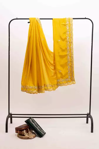 Yellow embroidered silk blend saree