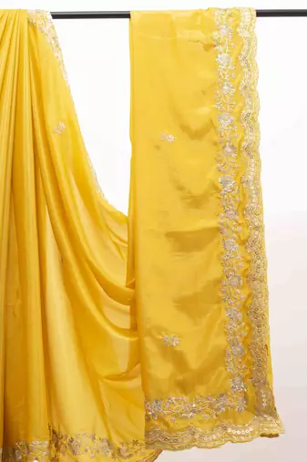 Yellow embroidered silk blend saree