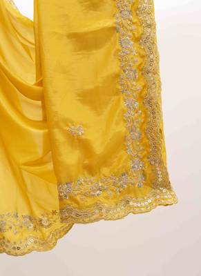 Yellow embroidered silk blend saree 5