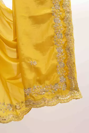 Yellow embroidered silk blend saree