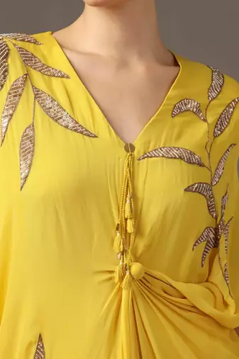 Yellow embroidered draped dress