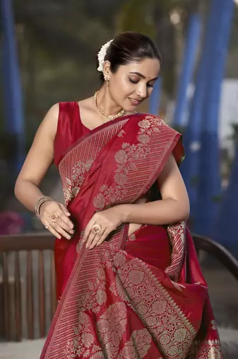Banarasi woven red jacquard work saree with blouse piece