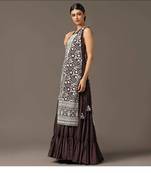 Purple tiered sleeveless anarkali gown with a white parsi straight cape