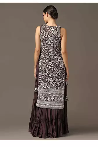 Purple tiered sleeveless anarkali gown with a white parsi straight cape