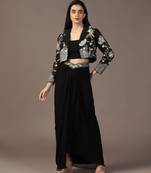 Black top with draped skirt and embroidered jacket
