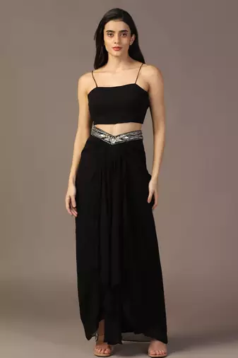 Black top with draped skirt and embroidered jacket