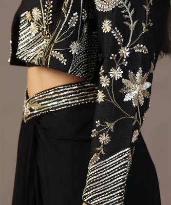 Black top with draped skirt and embroidered jacket 5