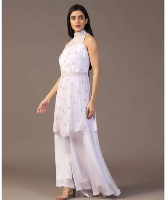 White peplum top with flared pant 1