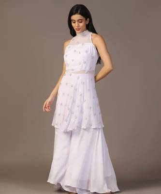 White peplum top with flared pant 3