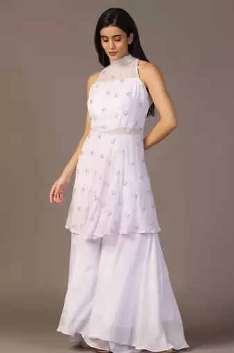 White peplum top with flared pant