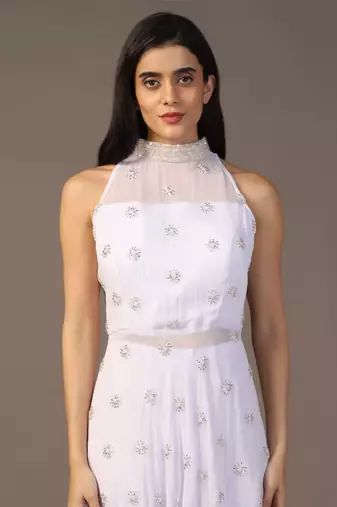 White peplum top with flared pant