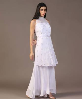 White peplum top with flared pant 5