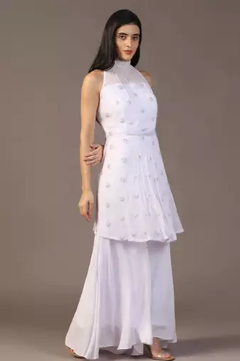 White peplum top with flared pant
