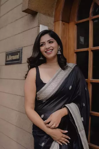 Black color silk blend saree with blouse