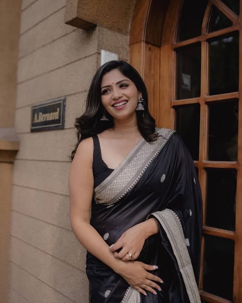 Black color silk blend saree with blouse