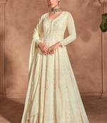 Beige embroidery sequinse georgette gown suit- free size stitched(size upto 42")
