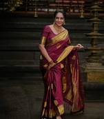 Maroon woven banarasi cotton silk saree with blouse piece