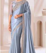 blue embroidered georgette saree with unstitched blouse piece
