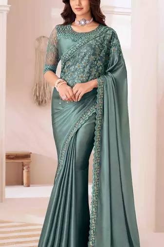 turquoise embroidered georgette saree with unstitched blouse piece