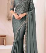 teal embroidered georgette saree with unstitched blouse piece