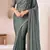 teal embroidered georgette saree with unstitched blouse piece