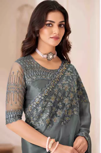 teal embroidered georgette saree with unstitched blouse piece