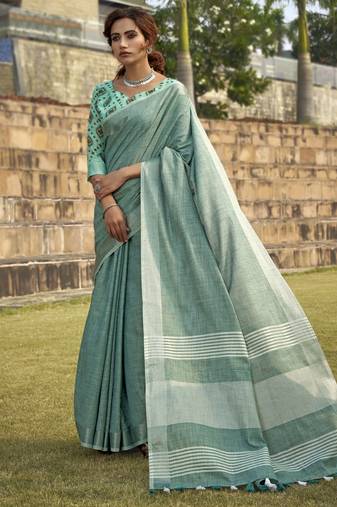 Turquoise linen saree with unstitched linen blouse piece