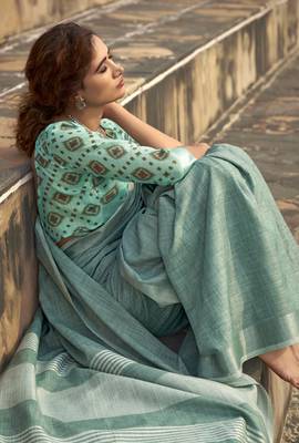 Turquoise linen blend saree with unstitched linen blouse piece 2