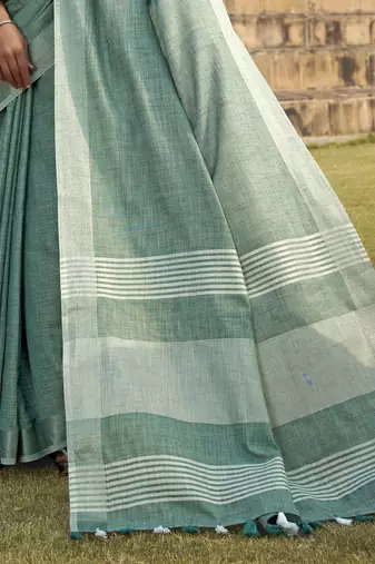 Turquoise linen blend saree with unstitched linen blouse piece