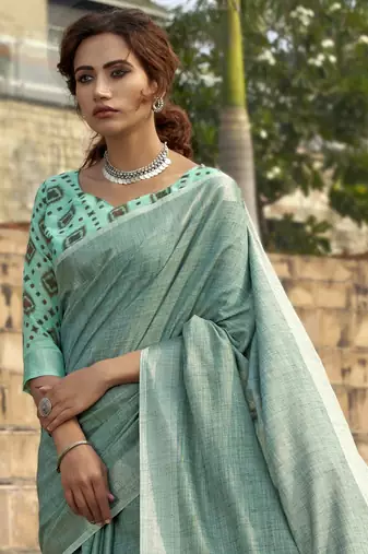 Turquoise linen blend saree with unstitched linen blouse piece