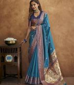 Teal silk blend saree with unstitched blouse piece