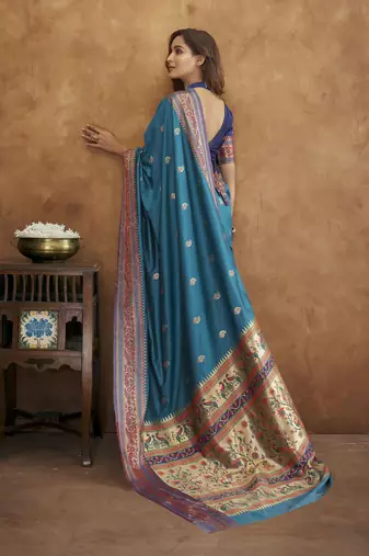 Teal silk blend saree with unstitched blouse piece