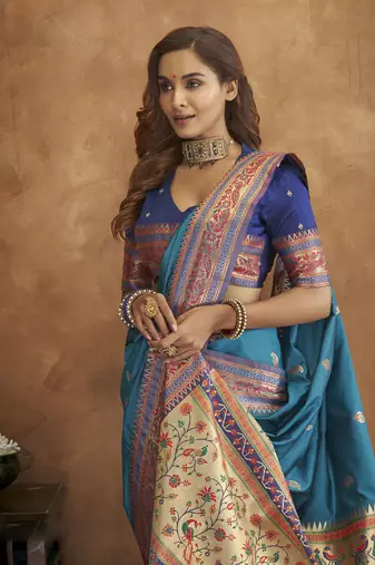 Teal silk blend saree with unstitched blouse piece