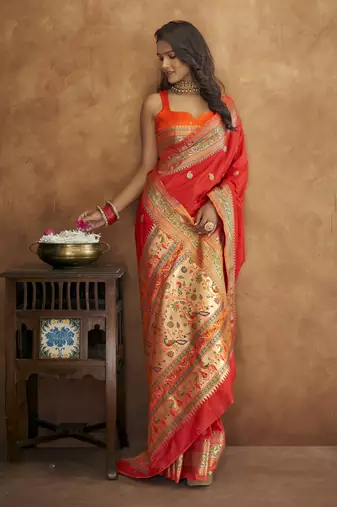 Red silk blend saree with unstitched blouse piece