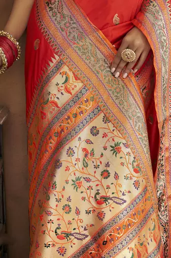 Red silk blend saree with unstitched blouse piece
