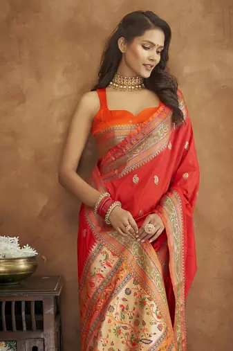 Red silk blend saree with unstitched blouse piece