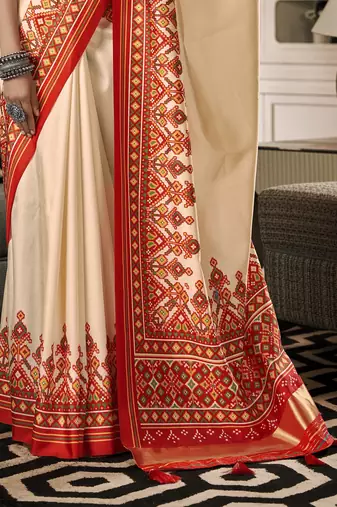 Beige patola silk blend saree with unstitched patola blouse piece