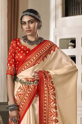 Beige patola silk blend saree with unstitched patola blouse piece