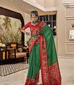 Dark green-red patola silk blend saree with unstitched patola blouse piece
