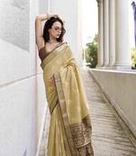 Beige rayon silk blend saree with unstitched rayon blouse piece