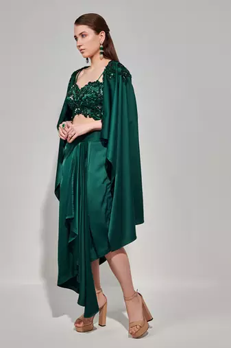 Emerald green hand embroidered cape set with cutwork blouse and drape skirt