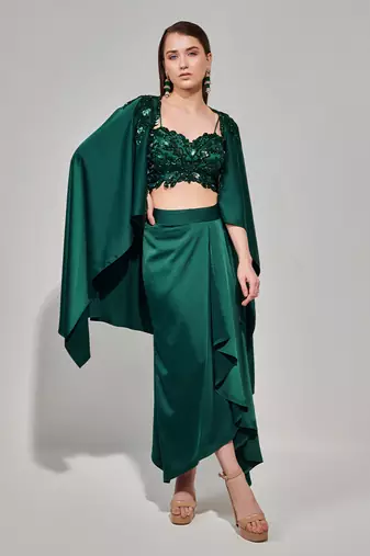 Emerald green hand embroidered cape set with cutwork blouse and drape skirt