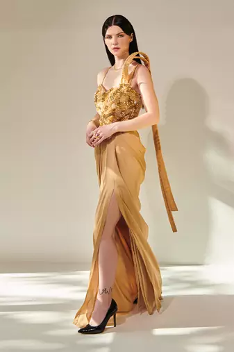 Golden hand embroidered drape gown with 3d hand embellished trail