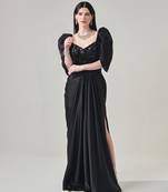 Black draped gown with voluminous sleeves