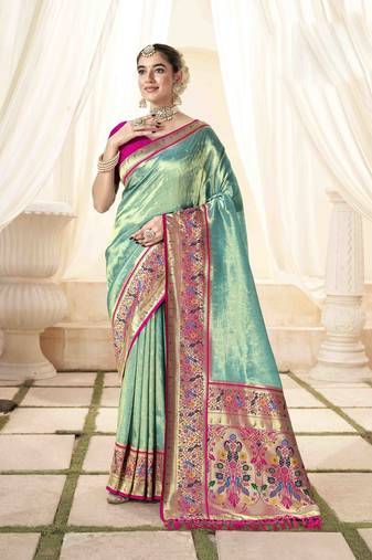 Turquoise tissue silk blend saree with unstitched tissue blouse piece