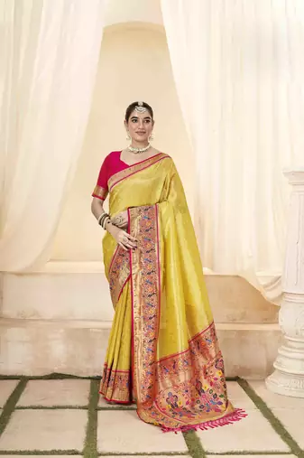 Yellow tissue silk blend saree with unstitched tissue blouse piece
