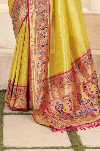 Yellow tissue silk blend saree with unstitched tissue blouse piece